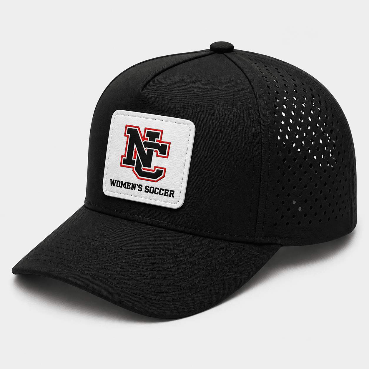 ChatGPT Image Aug 11 2026 12_59_07 PM | Greatest Of All Tees | GOAT Black trucker-style cap with mesh back and a white patch that reads 'NC Women's Soccer' on the front panel.