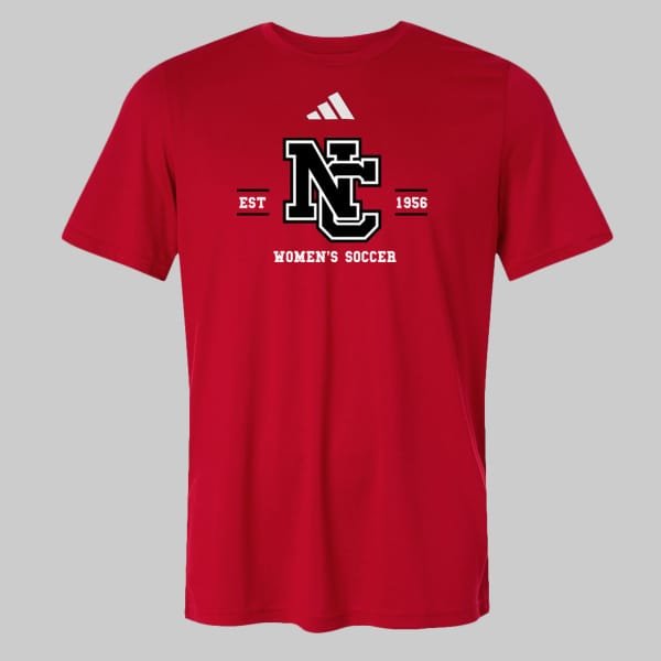 NCWS-EST-1956-Adidas-Mens-Pregame-T-Shirt-Red-V2 | Greatest Of All Tees | GOAT Red women's soccer T-shirt featuring a large NC logo, 'EST 1956' with an Adidas mark above, and 'WOMEN'S SOCCER' text.